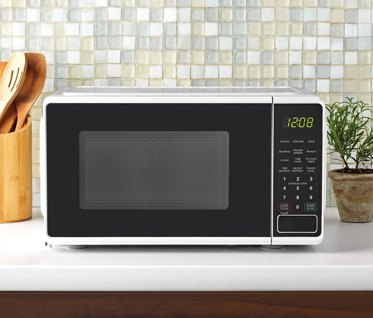 Mainstays Countertop Microwave Oven 0.7 Cu Ft 700 Watts White - MSF0W100072352